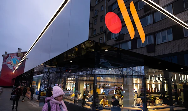 People line up to visit a newly opened restaurant in a former McDonald's outlet in Bolshaya Bronnaya Street in Moscow, Russia, Wednesday, Jan. 25, 2023.(AP)