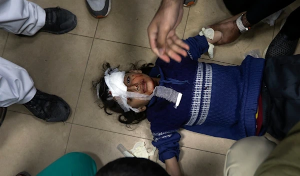 Palestinian child wounded in the Israeli bombardment of the Gaza Strip is brought to Al Aqsa hospital in Deir al Balah, Gaza Strip, Monday, March 25, 2024. (AP)