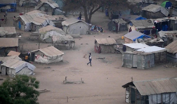 People stand by their houses in Juba, South Sudan, on Feb. 5, 2023.(AP)