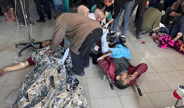 Palestinians wounded in an Israeli strike while waiting for humanitarian aid on the beach in Gaza City are treated in Shifa Hospital in Gaza City, Thursday, Feb. 29, 2024. (AP)