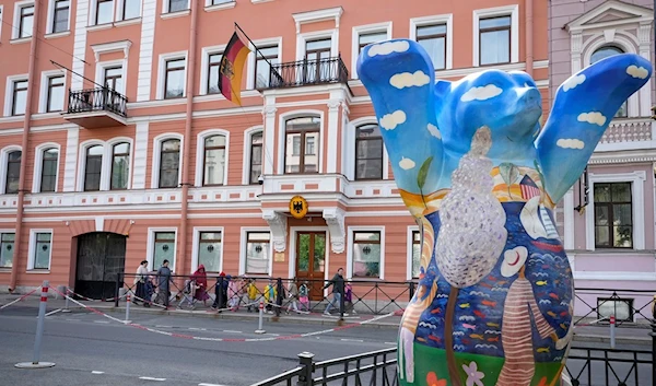 People walk past the German Consulate General building in St. Petersburg, Russia, Thursday, June 1, 2023. (AP)