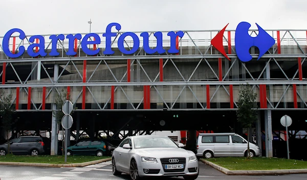 Car leaves a Carrefour supermarket in Anglet, southwestern France, on Jan.23, 2018.(AP)