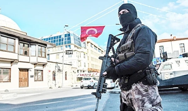 A Turkish special force police officer stands guard at ortakoy, in Istanbul, Turkey. (AFP)