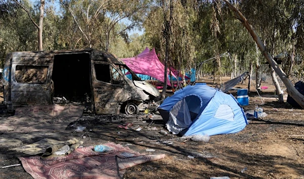 The site of a music festival near the border with the Gaza Strip in southern occupied Palestine, on Thursday, Oct. 12, 2023 (AP)