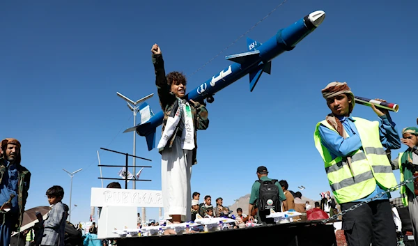 Yemenis attend a rally against the US-led strikes on Yemen and 'Israel's' war on Gaza, in Sanaa, Yemen, Friday, Feb. 23, 2024. (AP)