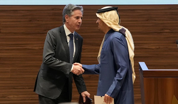 US Secretary of State Antony Blinken and Qatar's Prime Minister and Foreign Affairs Minister Mohammed Bin Abdulrahman Al Thani shake hands after their joint press conference at Diwan Annex, in Doha, Qatar, Tuesday, Feb. 6, 2024. (AP)