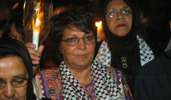 Leila Khaled, pictured on 28 July 2006 marches through the streets of Cape Town city centre, South Africa (AFP)