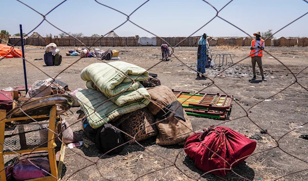 The belongings of people who crossed the border from Sudan sit in a yard at the Joda border crossing in South Sudan Tuesday, May 16, 2023. (AP)