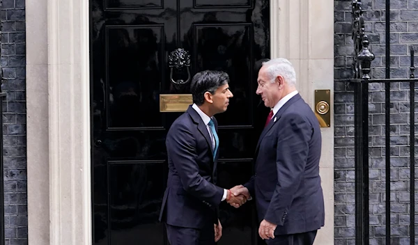 Britain's Prime Minister Rishi Sunak, left, welcomes Israeli Prime Minister Benjamin Netanyahu at Downing Street in London, Friday, March 24, 2023.(AP)