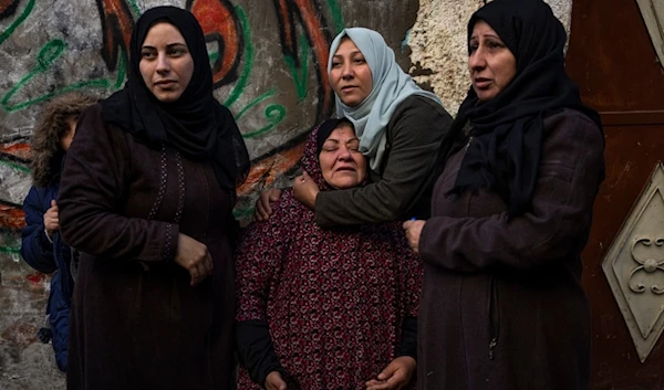 Palestinian women react after their home was hit by an Israeli strike in Rafah, southern Gaza Strip, Thursday, Feb. 8, 2024. (AP)