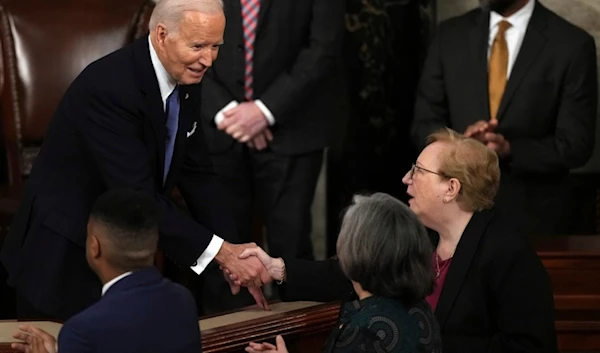 President Joe Biden shakes hands after he delivered the State of the Union address to a joint session of Congress at the U.S. Capitol, Thursday March 7, 2024, in Washington. (AP Photo/Andrew Harnik)