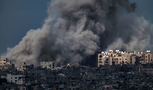 Smoke rises to the sky following an explosion in the Gaza Strip, as seen from southern occupied Palestine, Friday, March 8, 2024. (AP)