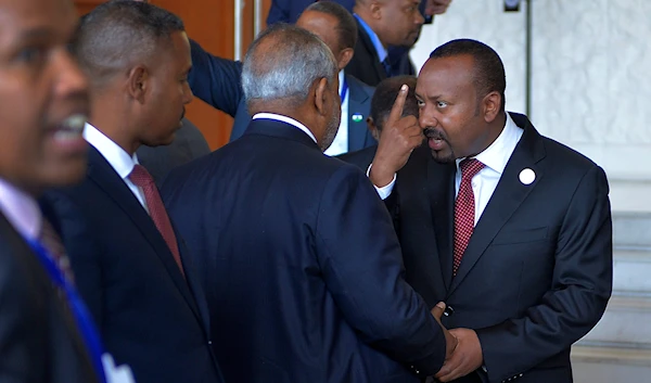 Ethiopian Prime Minister Abiy Ahmed, center, engage with other African leaders at the opening session of the 37th Ordinary session of the Assembly of the African Union (AU) Summit in Addis Ababa, Ethiopia, Saturday, February 17, 2024 (AP)