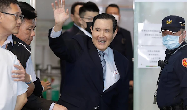 Former Taiwan President Ma Ying-jeou waves as Ma leaves for China, at Taoyuan International Airport in Taoyuan City, northern Taiwan, Monday, April 1, 2024.  (AP)