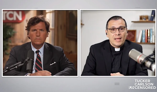 Screengrab from Tucker Carlson's interview with Palestinian pastor Rev. Dr. Munther Isaac. (Screengrab)