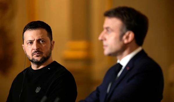 French President Emmanuel Macron, right, and his Ukrainian counterpart Volodymyr Zelenskyy attend a joint press conference after signing an agreement, Friday, Feb. 16, 2024 at the Elysee Palace in Paris.