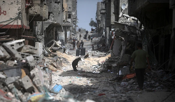 Palestinians visit their destroyed homes after Israeli forces left Khan Younis, Gaza Strip, Wednesday, March 6, 2024. (AP)