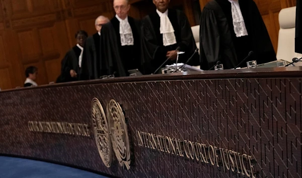 Judges enter the United Nations' highest court during historic hearings in The Hague, Netherlands, Wednesday, Feb. 21, 2024. (AP)