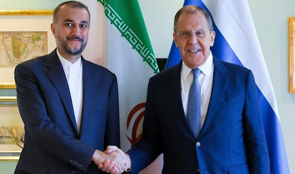 Iran's Foreign Minister Hossein Amir-Abdollahian and Russia's Foreign Minister Sergey Lavrov on the sideline of the BRICS in Cape Town, South Africa, June 2, 2023. (Russian MFA Press via AP)