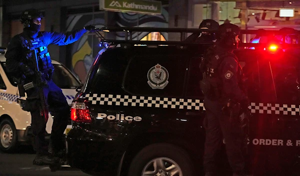 Tactical police leave Westfield Shopping Centre, where multiple people were stabbed in Sydney, Saturday, April 13, 2024. (AP)