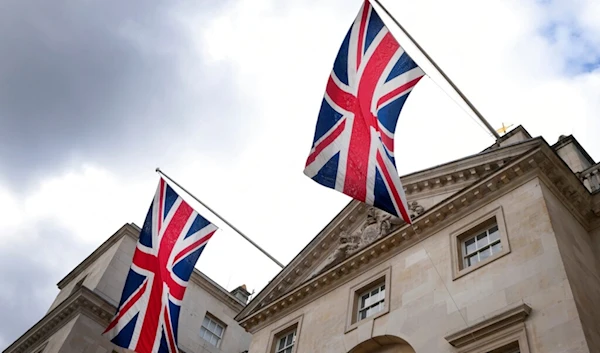 Union flags hang above Horseguards in Westminster in London, Thursday, Sept. 29, 2022. (AP)