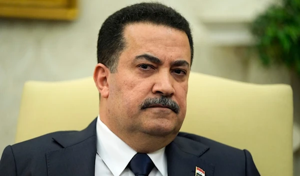 Iraq's Prime Minister Shia al-Sudani listens during a meeting with President Joe Biden in the Oval Office of the White House, Monday, April 15, 2024, in Washington. (AP Photo/Alex Brandon)