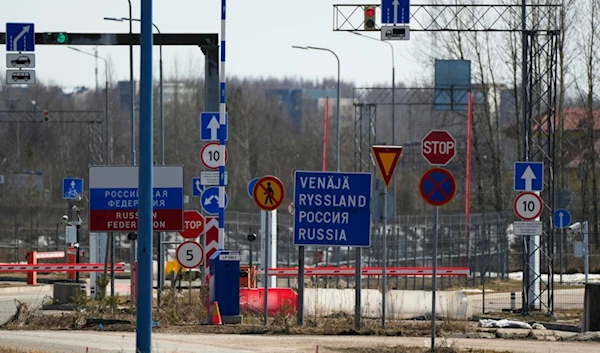 Road signs "Russian Federation", left, and "Russia" are seen at the Russian border crossing point Svetogorsk from Pelkola border crossing point in Imatra, south-eastern Finland, Friday, April 14, 2023. (AP)