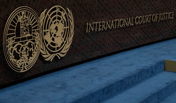 The logo of the International Court of Justice left, and that of the U.N., right, are seen on the judges' bench at the International Court of Justice, or World Court, in The Hague, Netherlands, Thursday, Oct. 12, 2023. (AP)