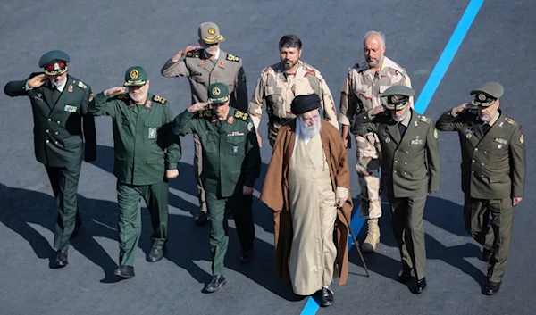 Supreme Leader Ayatollah Ali Khamenei reviews a group of armed forces cadets during their graduation ceremony accompanied by commanders of the armed forces, in Tehran, Iran, Tuesday, Oct. 10, 2023 (AP)