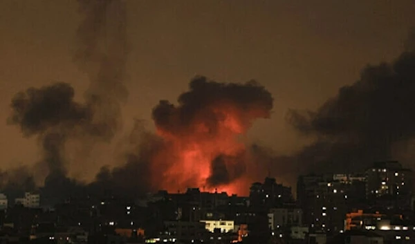 Explosions illuminate the sky during Israeli strikes on Gaza City on October 10, 2023. (AFP)