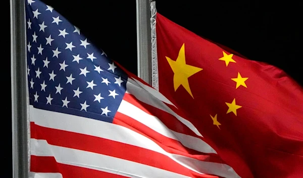 The American and Chinese flags wave at Genting Snow Park ahead of the 2022 Winter Olympics, Feb. 2, 2022, in Zhangjiakou, China (AP)