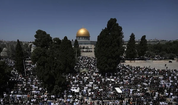 Muslim worshippers gather for Friday prayers, next to the Dome of the Rock Mosque in al-Aqsa Mosque in al-Quds, on April 5, 2024. (AP)