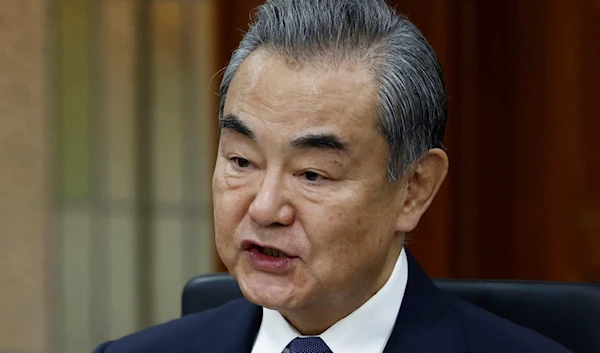 Chinese Foreign Minister Wang Yi speaks during a bilateral meeting with Indonesian Foreign Minister Retno Marsudi in Jakarta, Indonesia, Thursday, April 18, 2024. (AP)