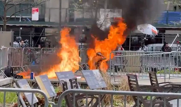 A man sets himself on fire outside the Manhattan courthouse in New York City where the trial of former President Donald Trump is taking place, April 20, 2024 (Social Media)