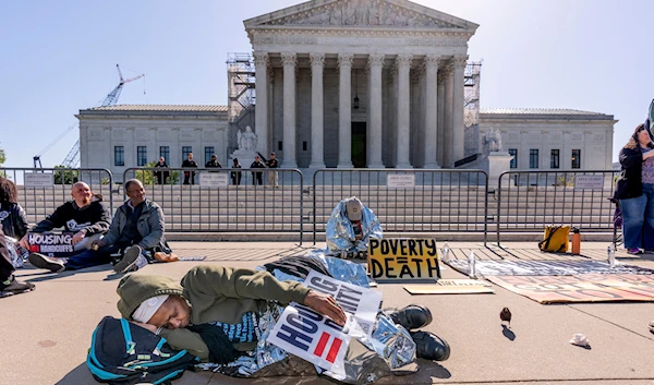 Activists demonstrate at the Supreme Court on Capitol Hill in Washington, Monday, April 22, 2024. (AP)