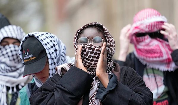 Demonstrators chant slogans outside the Columbia University campus, Thursday, April 18, 2024, in New York. (AP)