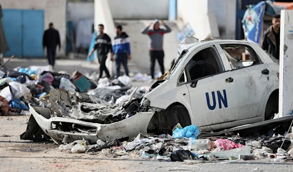 Palestinians walk through the destruction left by the Israeli air and ground offensive on the Gaza Strip in Gaza City, Saturday, Feb. 10, 2024. (AP Photo/Mohammed Hajjar)