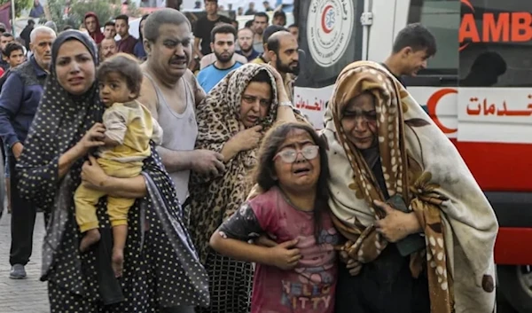 Wounded Palestinian family arrives to al-Shifa hospital, following Israeli airstrikes on Gaza City, central Gaza Strip, Monday, Oct. 16, 2023. (AP)