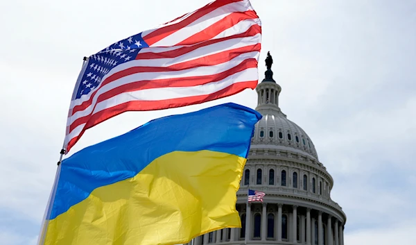 The American and Ukrainian flags wave in the wind outside of the Capitol on Tuesday, April 23, 2024, in Washington.(AP)