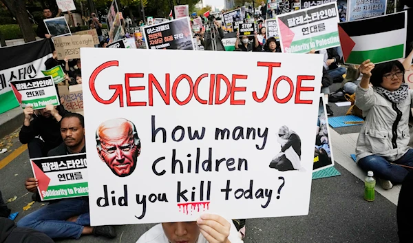 People stage a rally to urge "Israel" to stop its war on Gaza, in Seoul, South Korea, Saturday, Nov. 4, 2023. (AP)