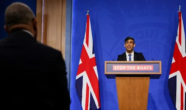 British Prime Minister Rishi Sunak speaks during a press conference in London on Monday regarding a treaty between Britain and Rwanda to transfer asylum-seekers to the African country. (AFP via Getty Images)