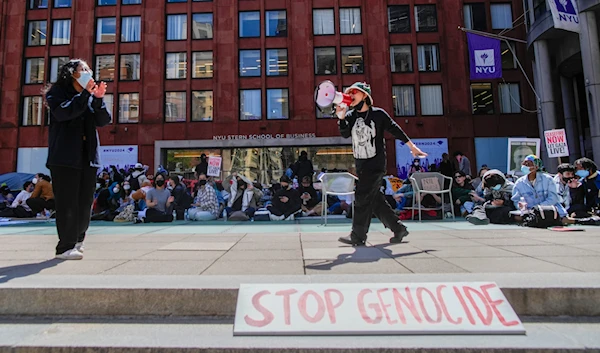 New York University students and pro-Palestinian supporters rally outside the NYU Stern School of Business building, Monday, April 22, 2024, in New York.  (AP)