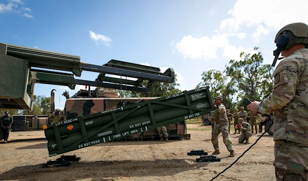 In this image provided by the U.S. Army U.S. Army Staff Sgt. Jimmy Lerma adjusts the Army Tactical Missile System (ATACMS) at Williamson Airfield in Australia, on July 26, 2023 (AP/US Army)