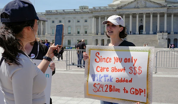 A TikTok content creator, speaks to reporters outside the U.S. Capitol, in Washington on April 23, 2024