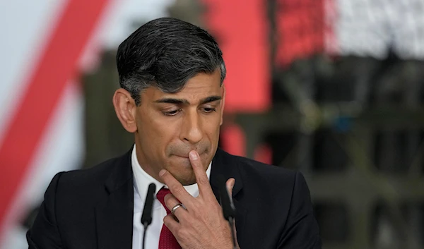 Britain's Prime Minister Rishi Sunak pauses as he addresses a press conference at the Warsaw Armoured Brigade in Warsaw, Poland, Tuesday, April 23, 2024. (AP)