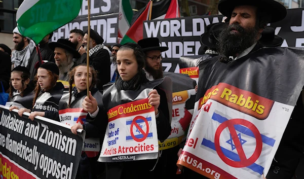 Pro-Palestinian protesters take part at a demonstration on Al Quds Day, in London on April 5, 2024. (AP)