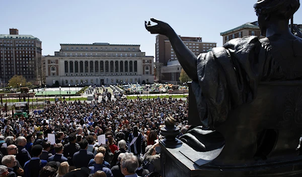 Columbia University professors speak in solidarity with their students' rights to protest free from arrest at the Columbia University campus in New York on Monday, April 22, 2024. (AP)