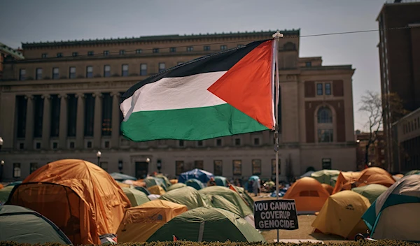 A Palestinian flag flutters in the wind during a pro-Palestinian encampment inside Columbia University Campus on Sunday, April 28, 2024, in New York. (AP)