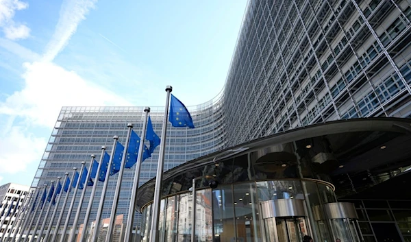 European Union flags flap in the wind outside EU headquarters in Brussels, Monday, March 25, 2024. (AP)