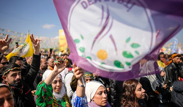 Supporters of the pro-Kurdish Peoples' Equality and Democracy Party (DEM Party) gather to celebrate Newroz festivity, marking the start of spring, in Istanbul, Turkey, on Sunday, March 17, 2024.(AP)